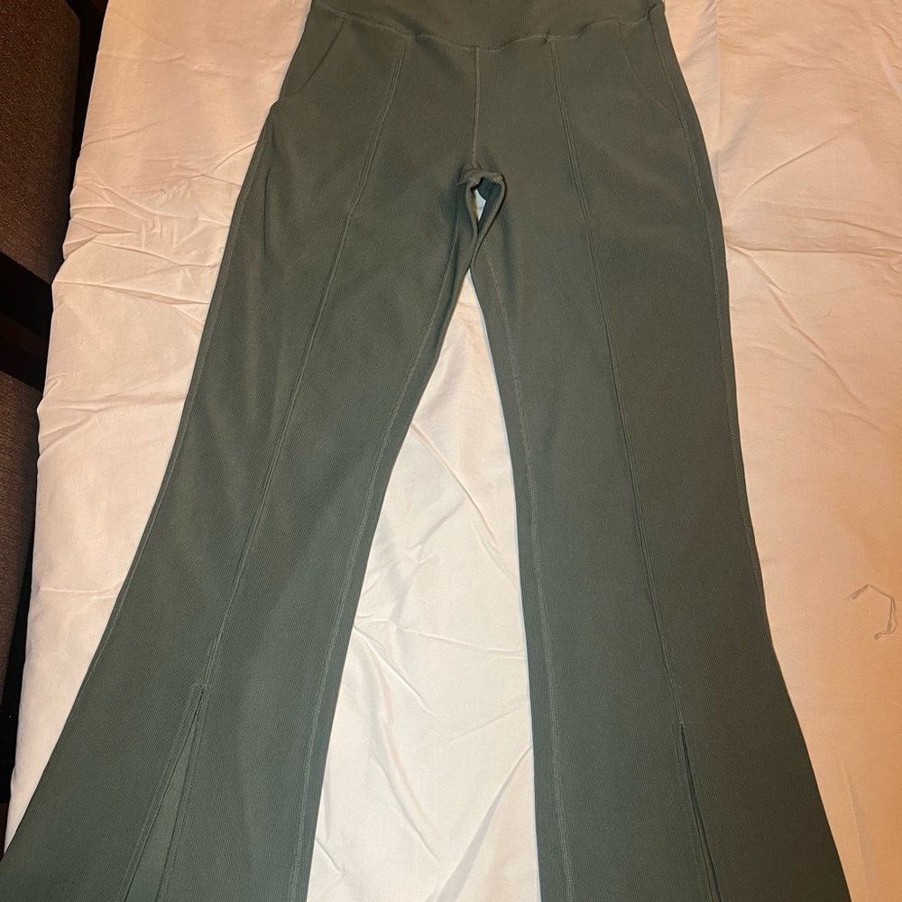 Move Theology dark sage green yoga pants